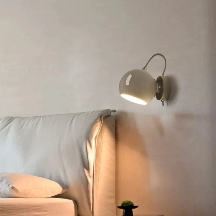 Adjustable Dome Cream Wall Lamp for Modern Interiors