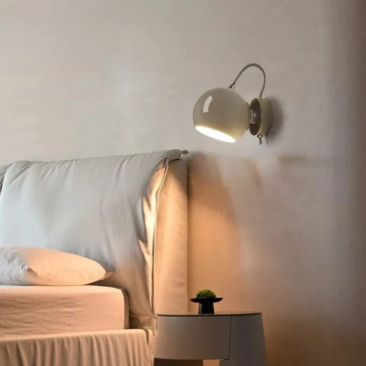 Adjustable Dome Cream Wall Lamp for Modern Interiors