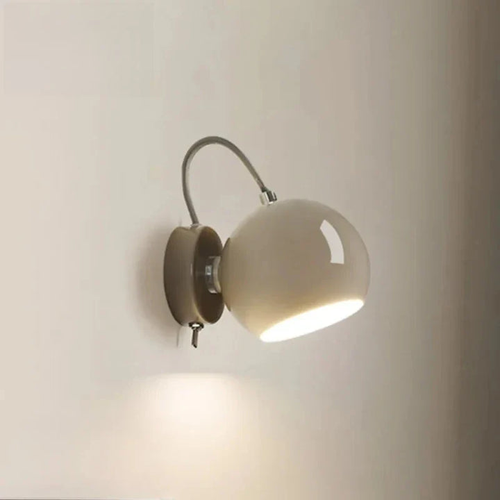 Adjustable Dome Cream Wall Lamp for Modern Interiors